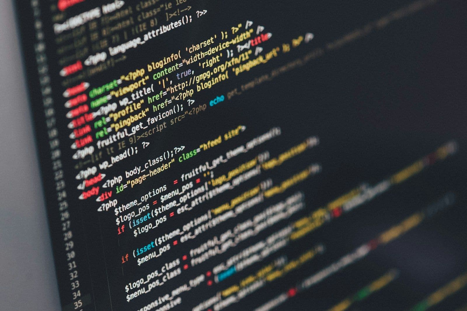 A dark code editor with syntax highlighted in yellow, pink and blue